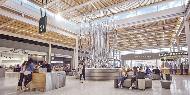 Travelers passing through Kansas City International Airport